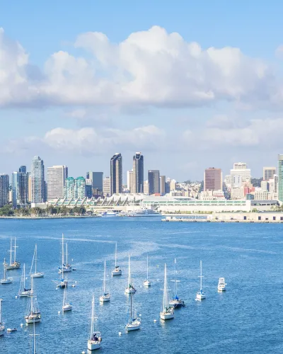 san diego cityscape seen from water with boats in foreground